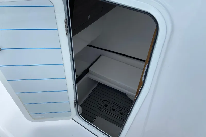 Slide: The Image of 2026 Sportsman Open 302 Center Console cabin interior view. - 48