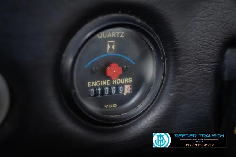 Slide: The Image of Dashboard of a 1992 MasterCraft ProStar boat with speedometer and digital display. - 29