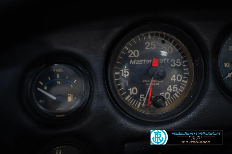 Slide: The Image of 1992 MasterCraft ProStar dashboard gauges, featuring temperature, pressure, and voltage indicators. - 30