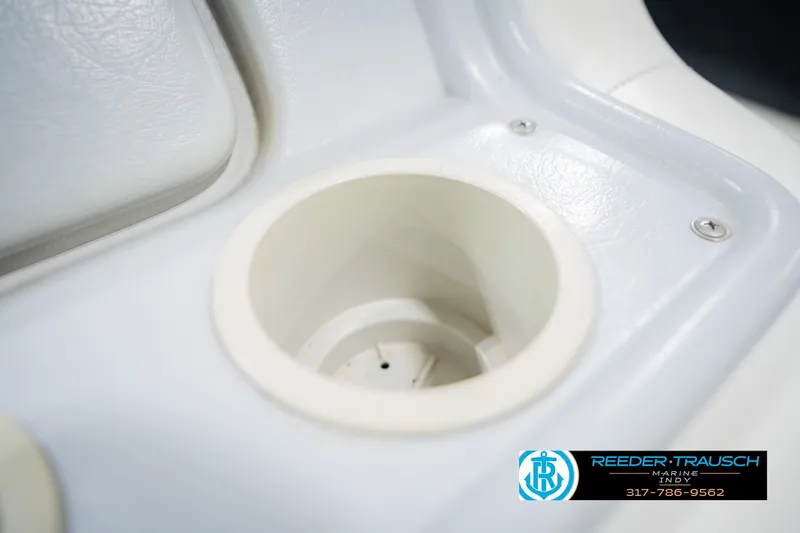 Slide: The Image of Carpeted interior of a 1992 MasterCraft ProStar boat, Reeder Trausch Marine logo visible. - 42