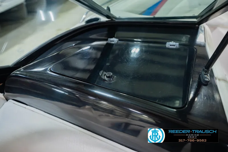 Slide: The Image of 1992 MasterCraft ProStar engine with blue valve covers and visible wiring. - 43