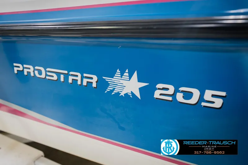Slide: The Image of 1992 MasterCraft ProStar boat trailer with visible logo and Reeder Trausch Marine contact details. - 49