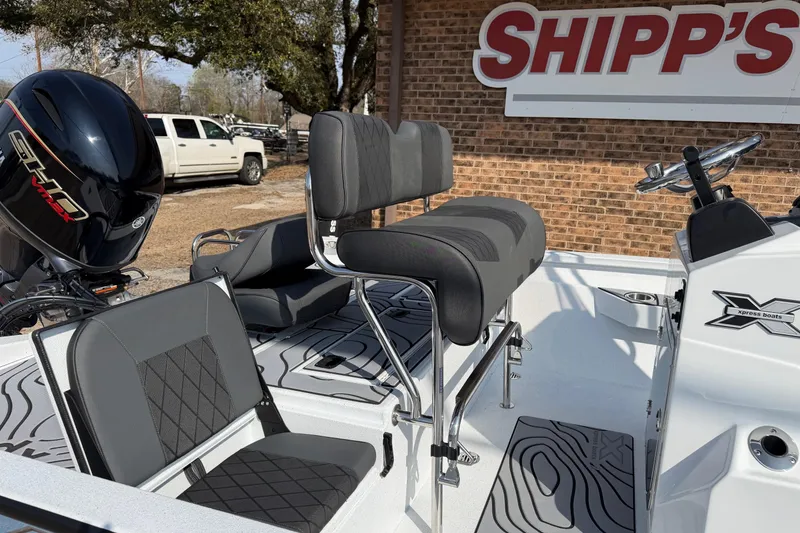 Slide: The Image of 2026 Xpress H20B Bay boat interior with seating and Yamaha engine, displayed at Shipp's. - 6
