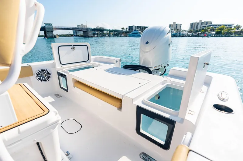 Slide: The Image of Manufacturer Provided Image: 2025 Sportsman Masters 227 Bay Boat interior with modern features on a sunny day. - 9