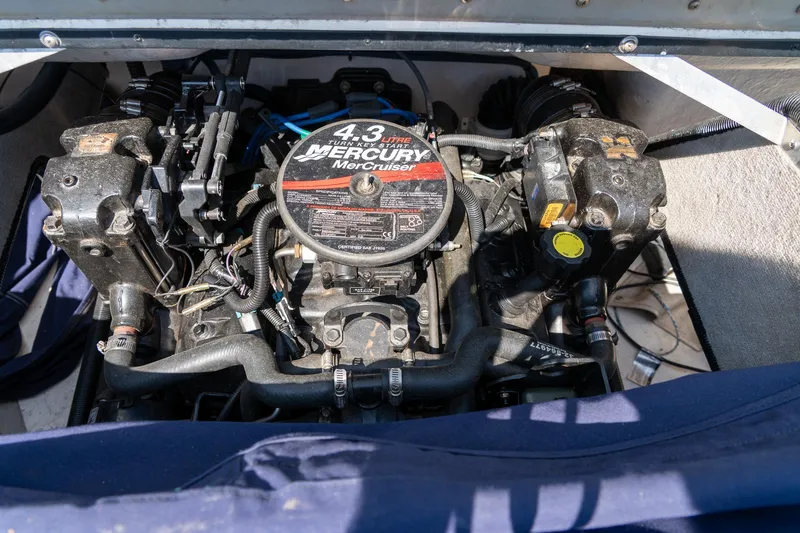 Slide: The Image of Engine compartment of a 2007 Bryant 190 boat with a 4.3L MerCruiser engine. - 26