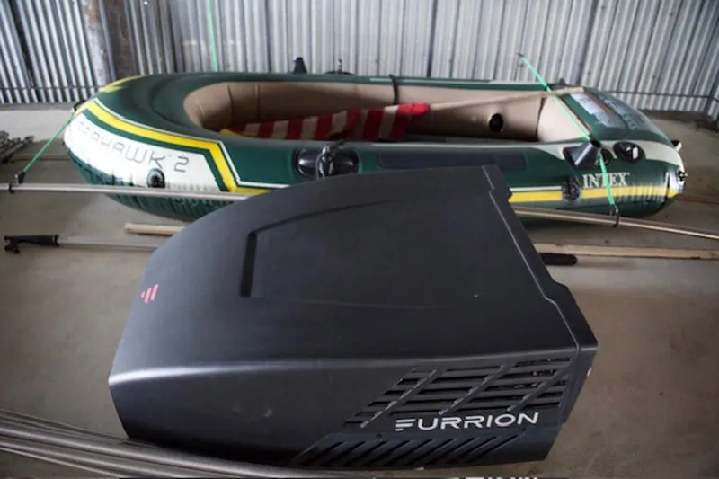 Slide: The Image of Inflatable boat and Furrion equipment in storage, Three Buoys 1985 houseboat model. - 35