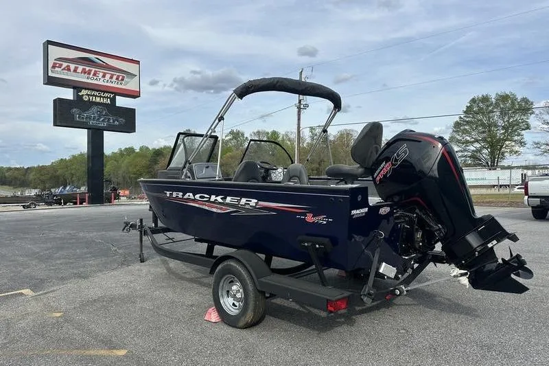 Slide: The Image of 2024 Tracker Pro Guide V-175 WT boat on trailer at dealership. - 3