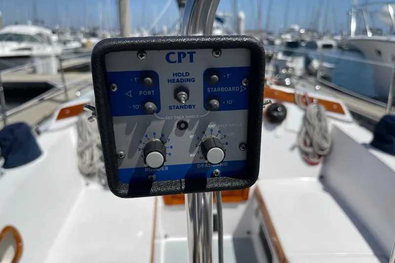 Slide: The Image of Cockpit control panel on a 1979 Catalina 38 sailboat, docked in a marina. - 20