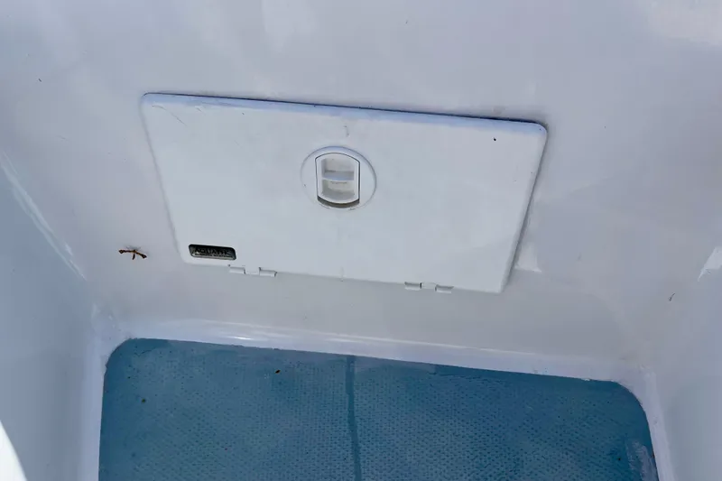 Slide: The Image of Hatch on 1979 Catalina 38 sailboat with blue non-slip flooring. - 22