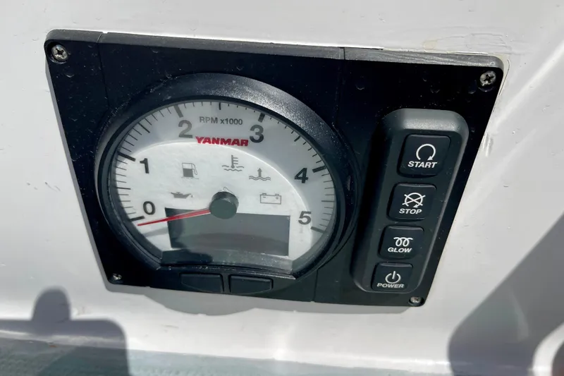 Slide: The Image of Yanmar tachometer and control panel on a 1979 Catalina 38 sailboat. - 25