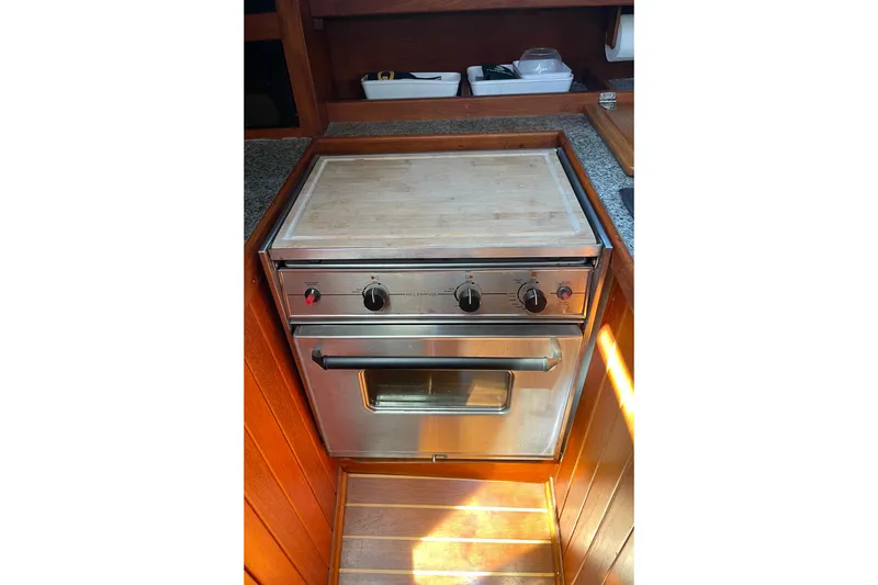 Slide: The Image of Stainless steel oven in a 1979 Catalina 38 yacht kitchen. - 30