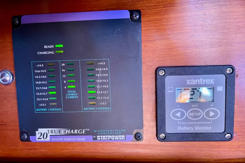 Slide: The Image of Battery monitor and charge display panel on a 1979 Catalina 38 sailboat. - 41