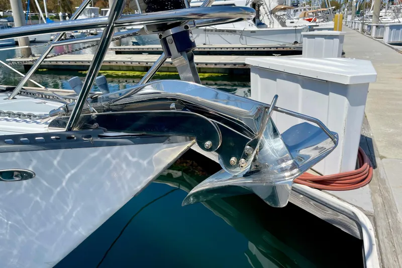 Slide: The Image of 1979 Catalina 38 sailboat anchor detail at marina dock. - 6