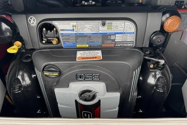Slide: The Image of Engine compartment of 2025 Crownline 280 SS boat with Mercury 350 engine. - 13