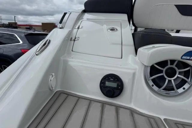 Slide: The Image of 2025 Crownline 280 SS boat interior with speaker and control panel. - 16