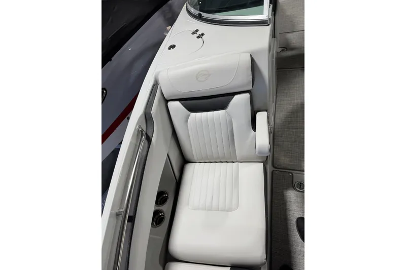 Slide: The Image of Luxurious seating in the 2025 Crownline 280 SS boat, featuring sleek white upholstery. - 28