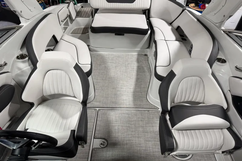 Slide: The Image of Interior of 2025 Crownline 280 SS boat with luxurious seating and modern design. - 30