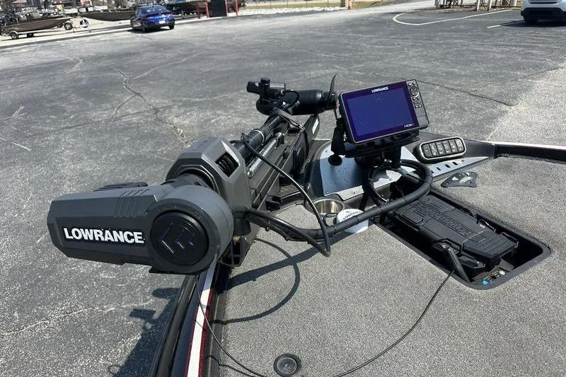 Slide: The Image of 2016 Triton 20 TrX boat with Lowrance electronics and trolling motor on deck. - 8