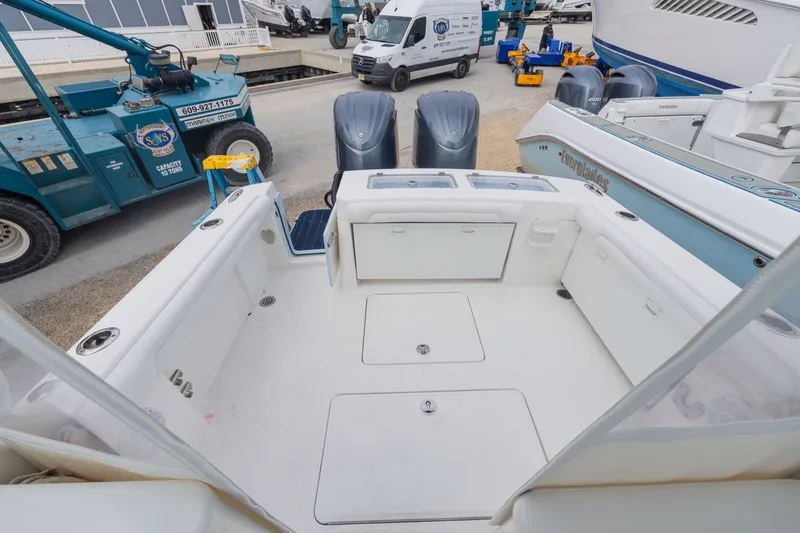 Slide: The Image of Interior view of a 2022 Albemarle 27 DC boat at the marina. - 15