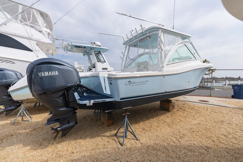 Slide: The Image of 2022 Albemarle 27 DC boat with Yamaha outboard motor. - 3