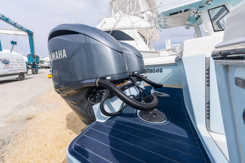 Slide: The Image of 2022 Albemarle 27 DC with Yamaha outboard engines at the dock. - 5
