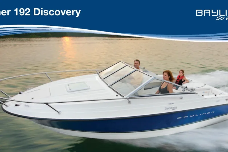 Slide: The Image of 2006 Bayliner 192 Discovery Cuddy cruising on a serene lake at sunset. - 4