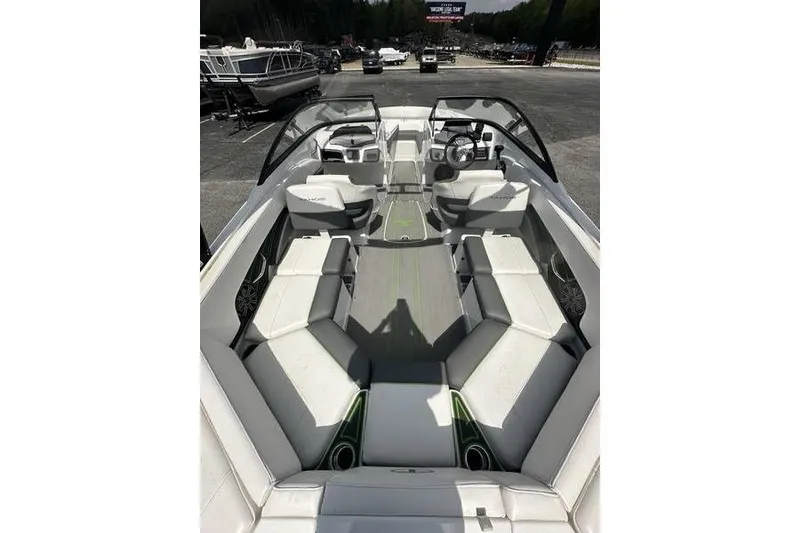 Slide: The Image of 2024 Tahoe 210 S boat interior with spacious seating and modern design. - 12