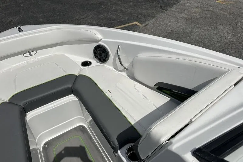 Slide: The Image of Interior of 2024 Tahoe 210 S boat with sleek seating and speaker system. - 5