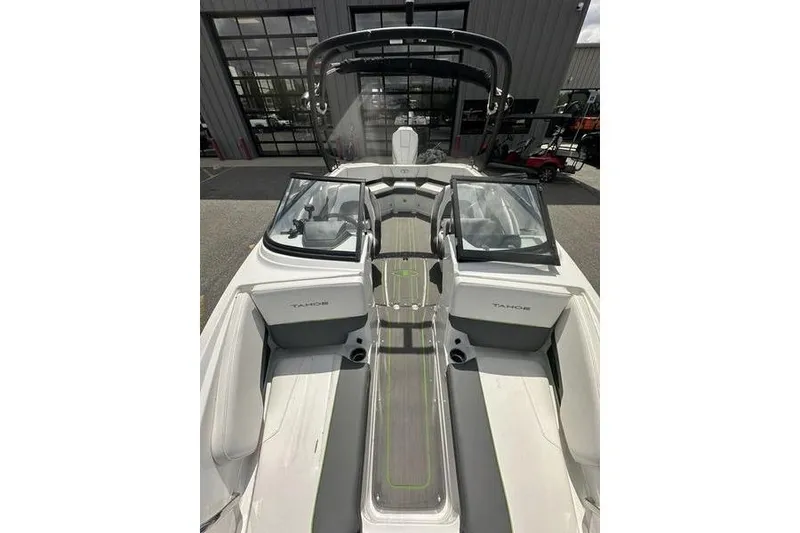 Slide: The Image of 2024 Tahoe 210 S boat interior with sleek seating and modern design. - 6