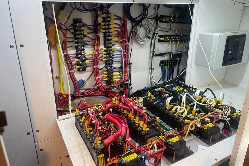 Slide: The Image of Electrical wiring and components inside a 1968 Hatteras 34 Sport Fisherman boat. - 28