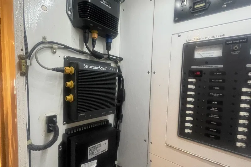 Slide: The Image of Electrical panel and StructureScan system inside a 1968 Hatteras 34 Sport Fisherman boat. - 36