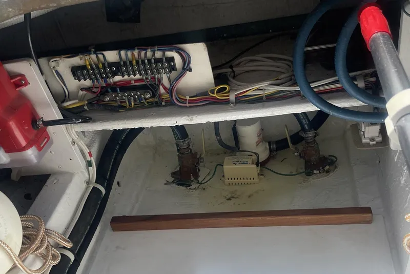 Slide: The Image of Electrical wiring and components inside a 1968 Hatteras 34 Sport Fisherman boat. - 38