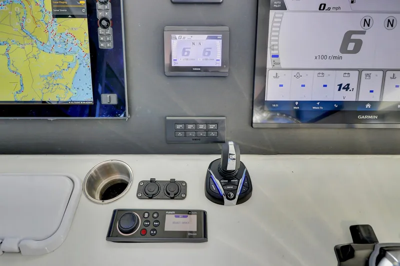 Slide: The Image of Control panel of 2024 Nerowalker 35 with navigation and throttle systems. - 13