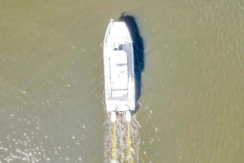Slide: The Image of Aerial view of 2024 Nerowalker 35 boat cruising on calm water. - 20