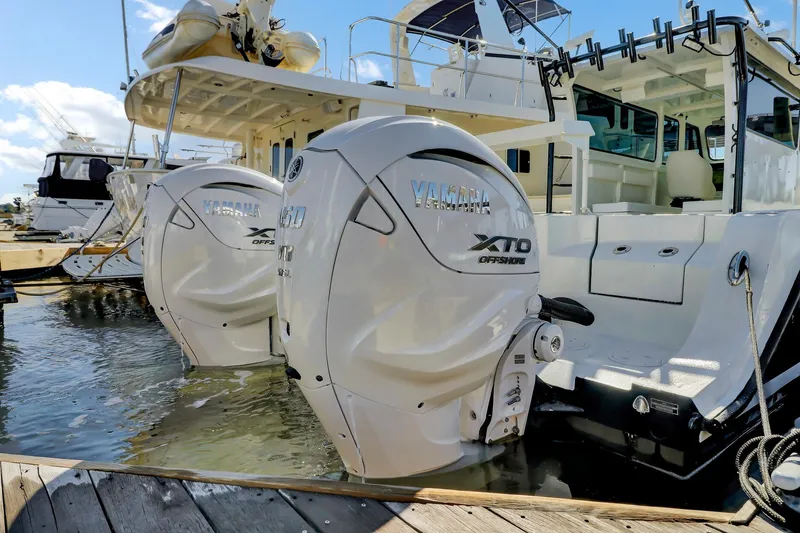 Slide: The Image of ```json { "alt_text": "2024 Nerowalker 35 boat with Yamaha XTO Offshore engines at dock." } ``` - 6