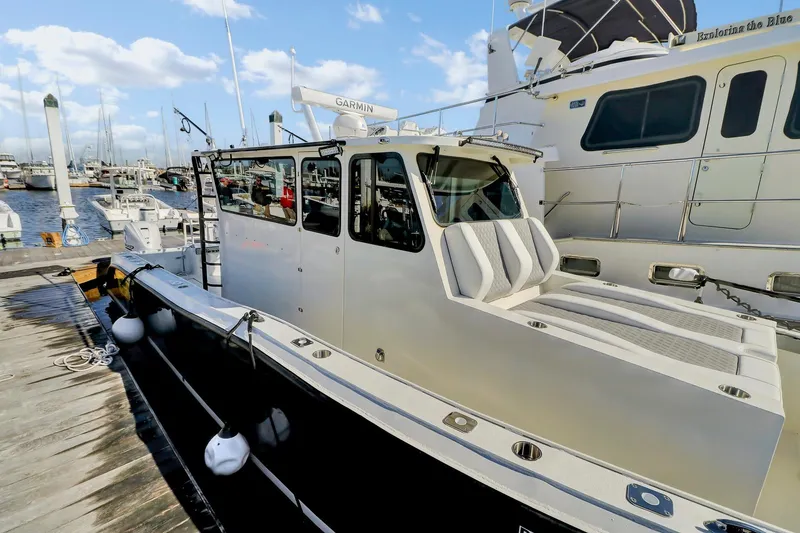 Slide: The Image of 2024 Nerowalker 35 boat docked at marina, featuring sleek design and modern equipment. - 8