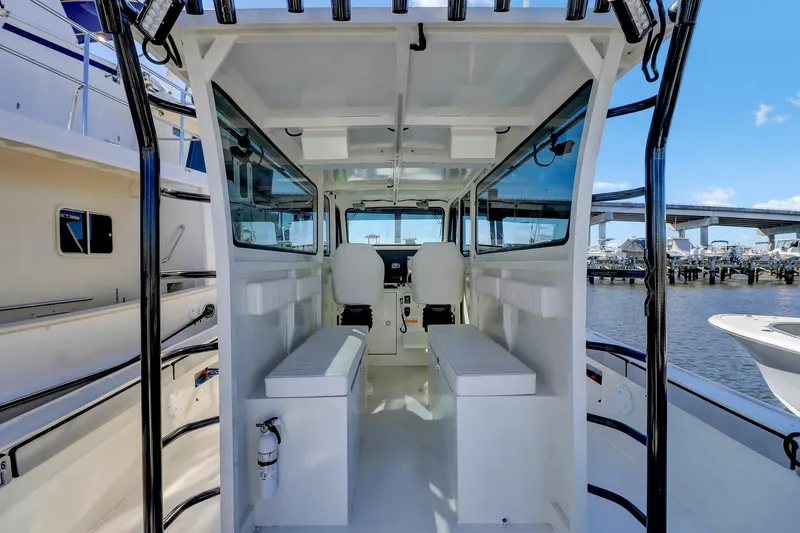 Slide: The Image of Interior view of 2024 Nerowalker 35 boat, featuring seating and control area. - 9