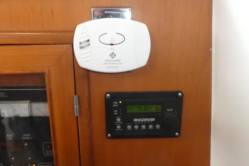 Slide: The Image of Carbon monoxide detector and control panel in 1989 Angel Pilothouse boat interior. - 18