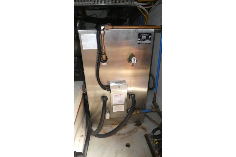 Slide: The Image of Stainless steel water heater in 1989 Angel Pilothouse boat engine room. - 40