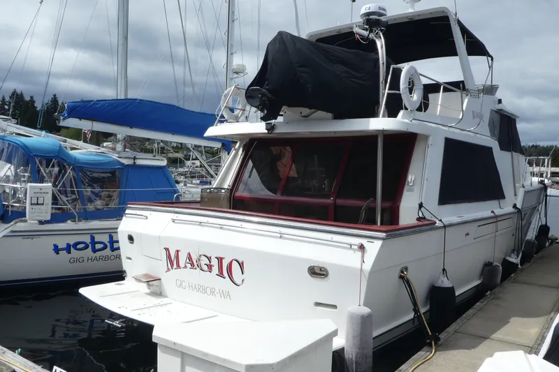 Slide: The Image of 1989 Angel Pilothouse yacht named "Magic" docked at Gig Harbor marina. - 52