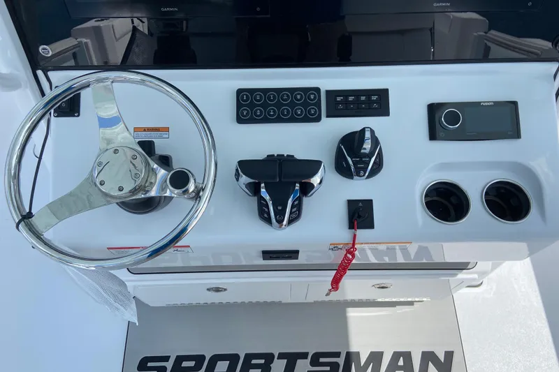 Slide: The Image of 2026 Sportsman Heritage 321 Center Console dashboard with steering wheel and controls. - 17