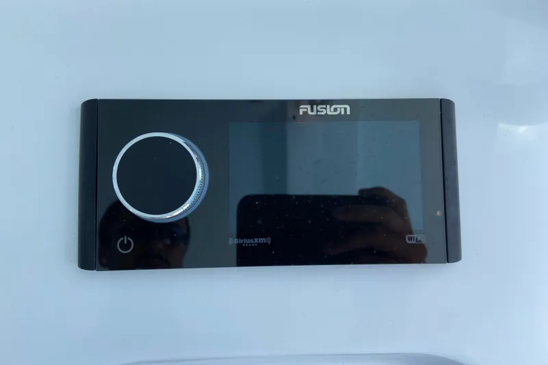Slide: The Image of Fusion audio system on 2026 Sportsman Heritage 321 Center Console boat. - 19