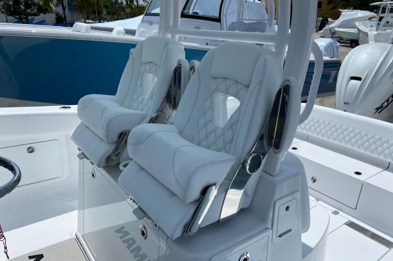 Slide: The Image of 2026 Sportsman Heritage 321 Center Console with luxurious white seating and modern design. - 22