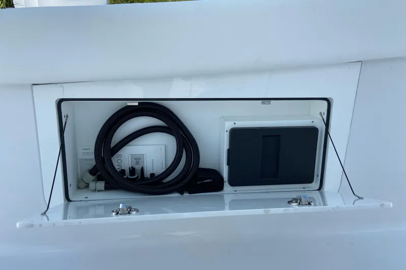 Slide: The Image of Storage compartment on 2026 Sportsman Heritage 321 Center Console boat. - 29