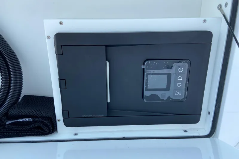 Slide: The Image of Control panel on 2026 Sportsman Heritage 321 Center Console boat, featuring modern interface. - 30