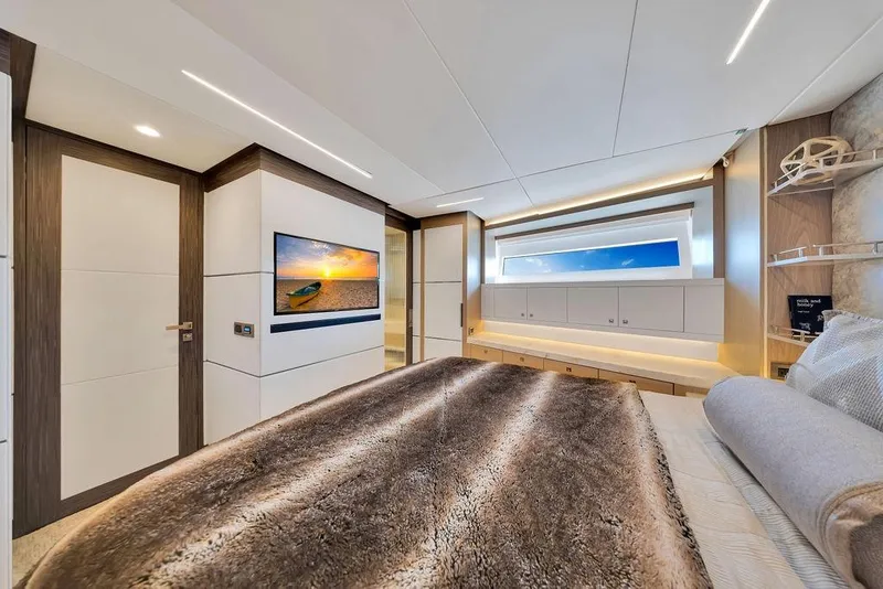 Slide: The Image of Luxurious 2020 Hargrave C92 yacht bedroom with modern decor and ocean view window. - 108
