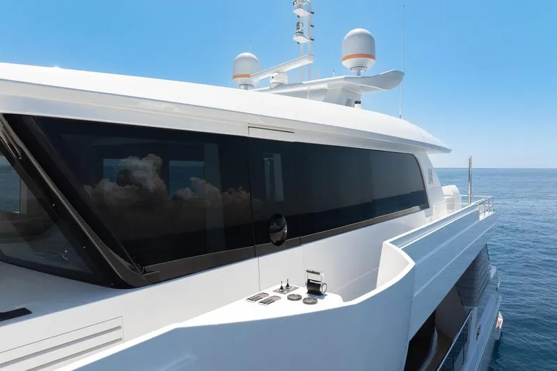 Slide: The Image of Luxury Hargrave C92 yacht, 2020 model, cruising on a clear blue sea. - 11
