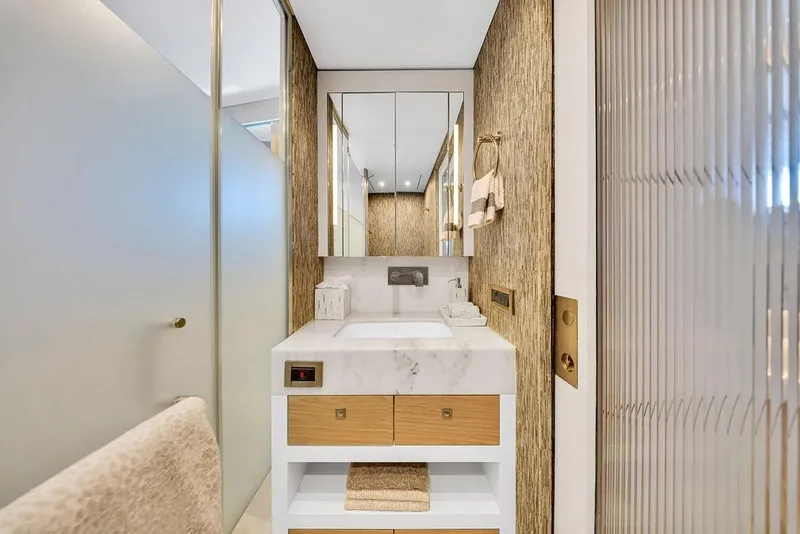 Slide: The Image of Luxurious bathroom interior on 2020 Hargrave C92 yacht, featuring modern fixtures and elegant design. - 112