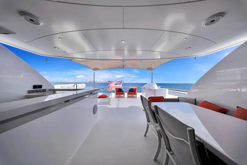 Slide: The Image of Luxurious 2020 Hargrave C92 yacht deck with seating, ocean view, and modern design. - 29
