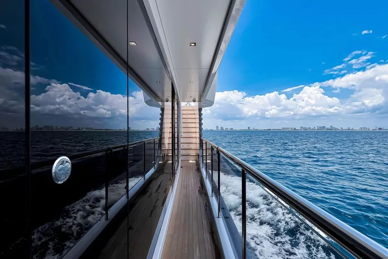Slide: The Image of 2020 Hargrave C92 yacht cruising on open sea under clear blue sky. - 53